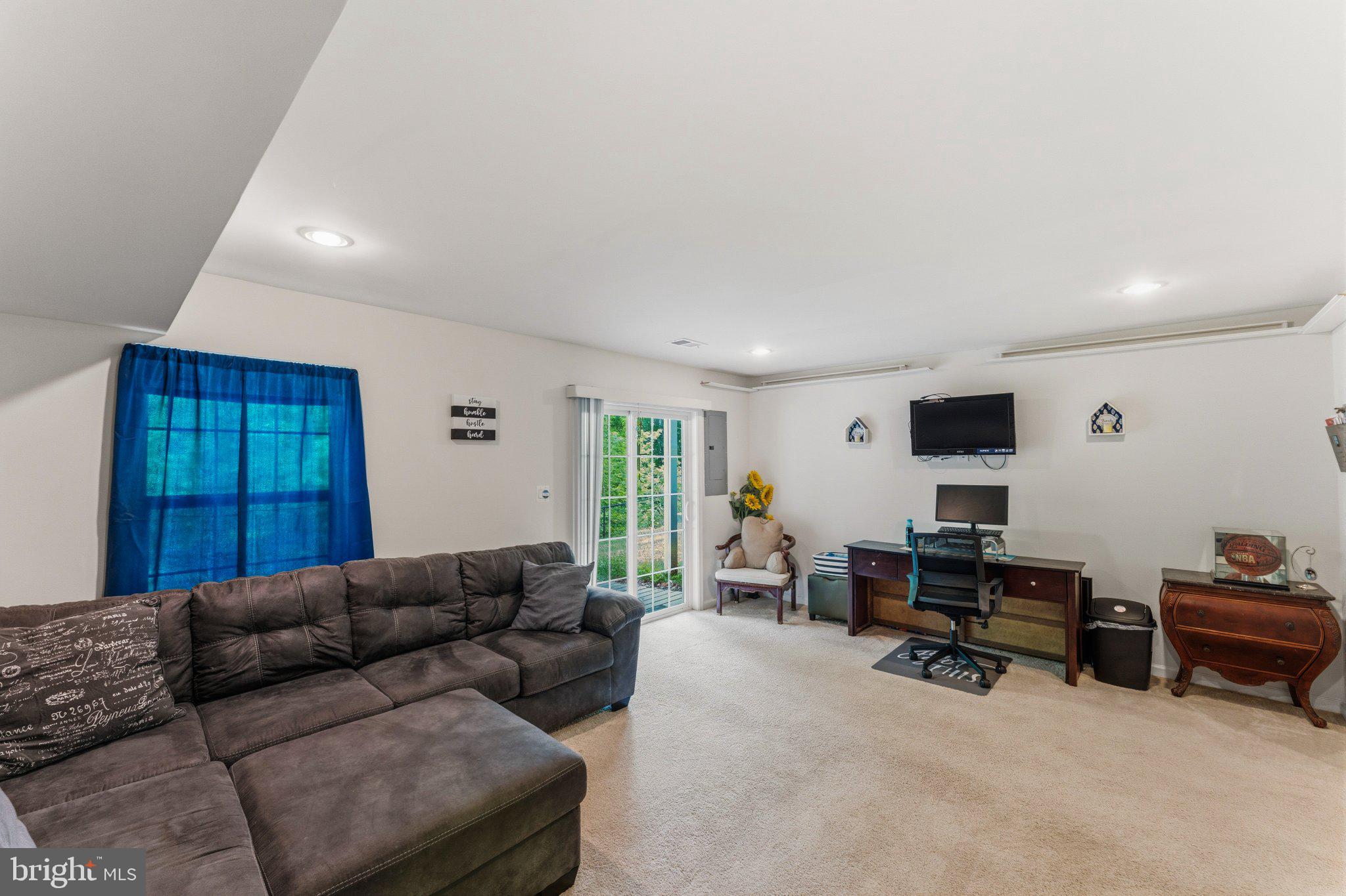 320 Tree Line Drive Fredericksburg, VA 22405 - Photo 12 of 49 a living room with furniture and a large window