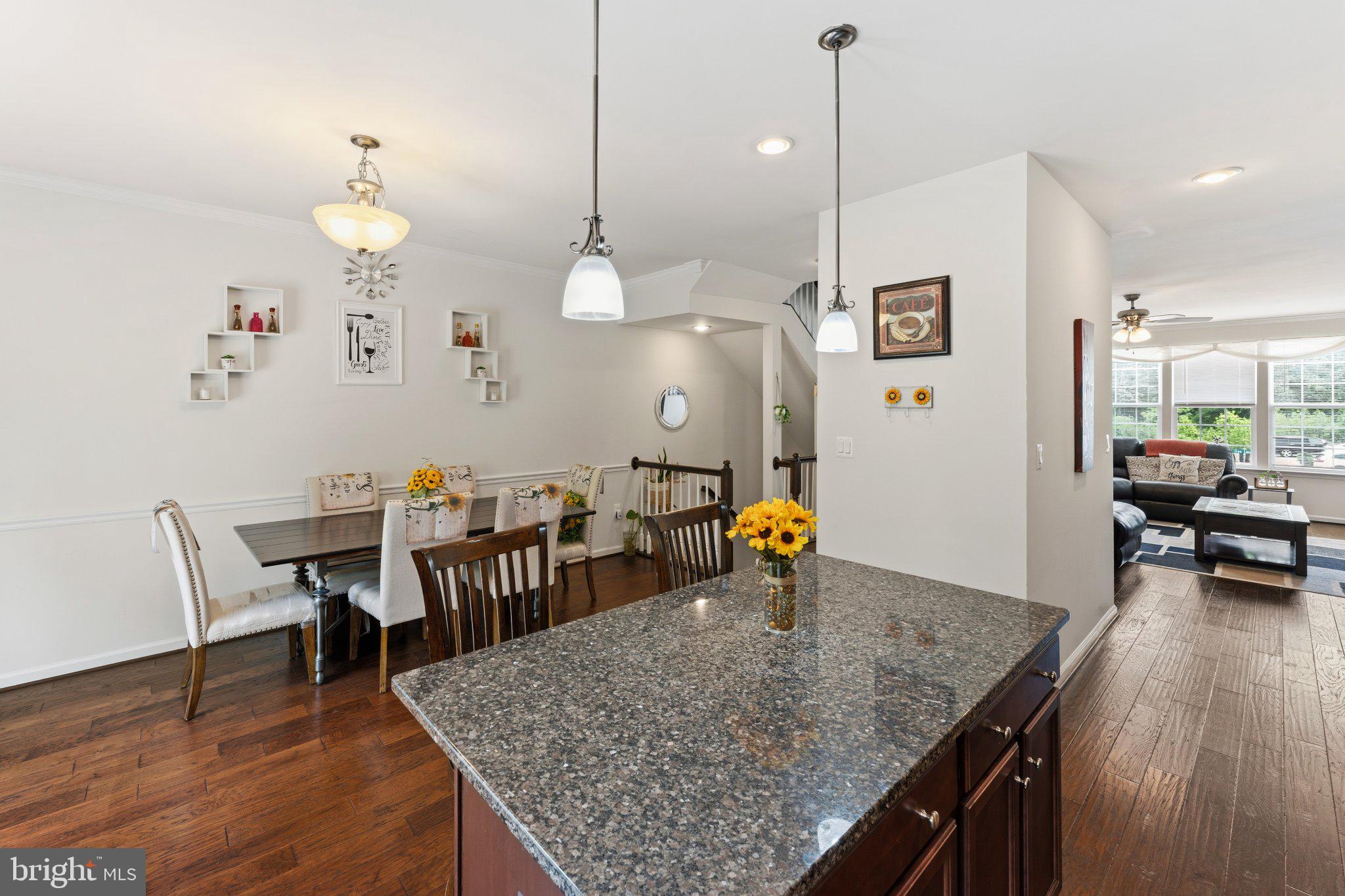 320 Tree Line Drive Fredericksburg, VA 22405 - Photo 19 of 49 a kitchen with a table chairs and a chandelier
