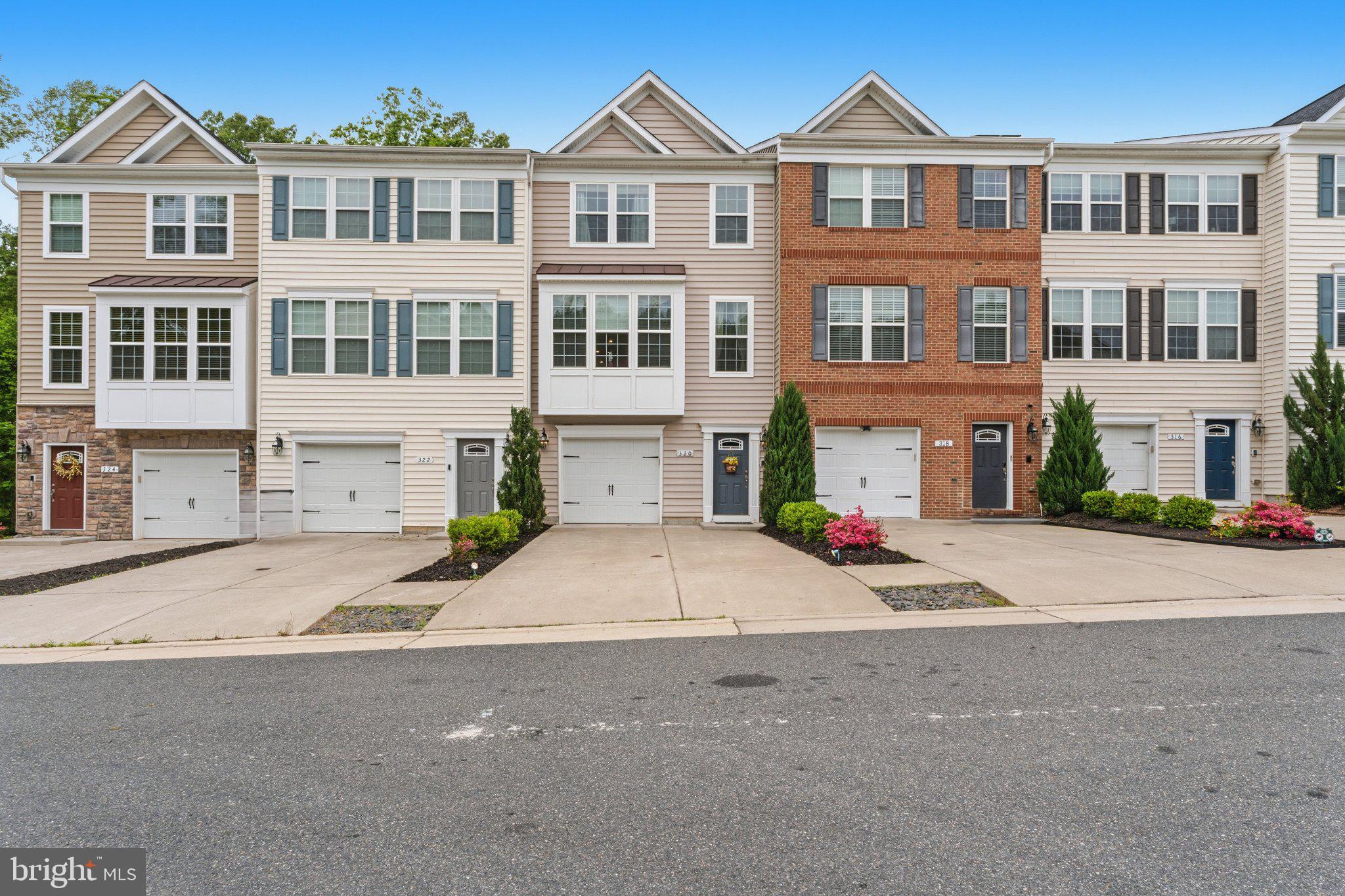 320 Tree Line Drive Fredericksburg, VA 22405 - Photo 2 of 49 a front view of building with street