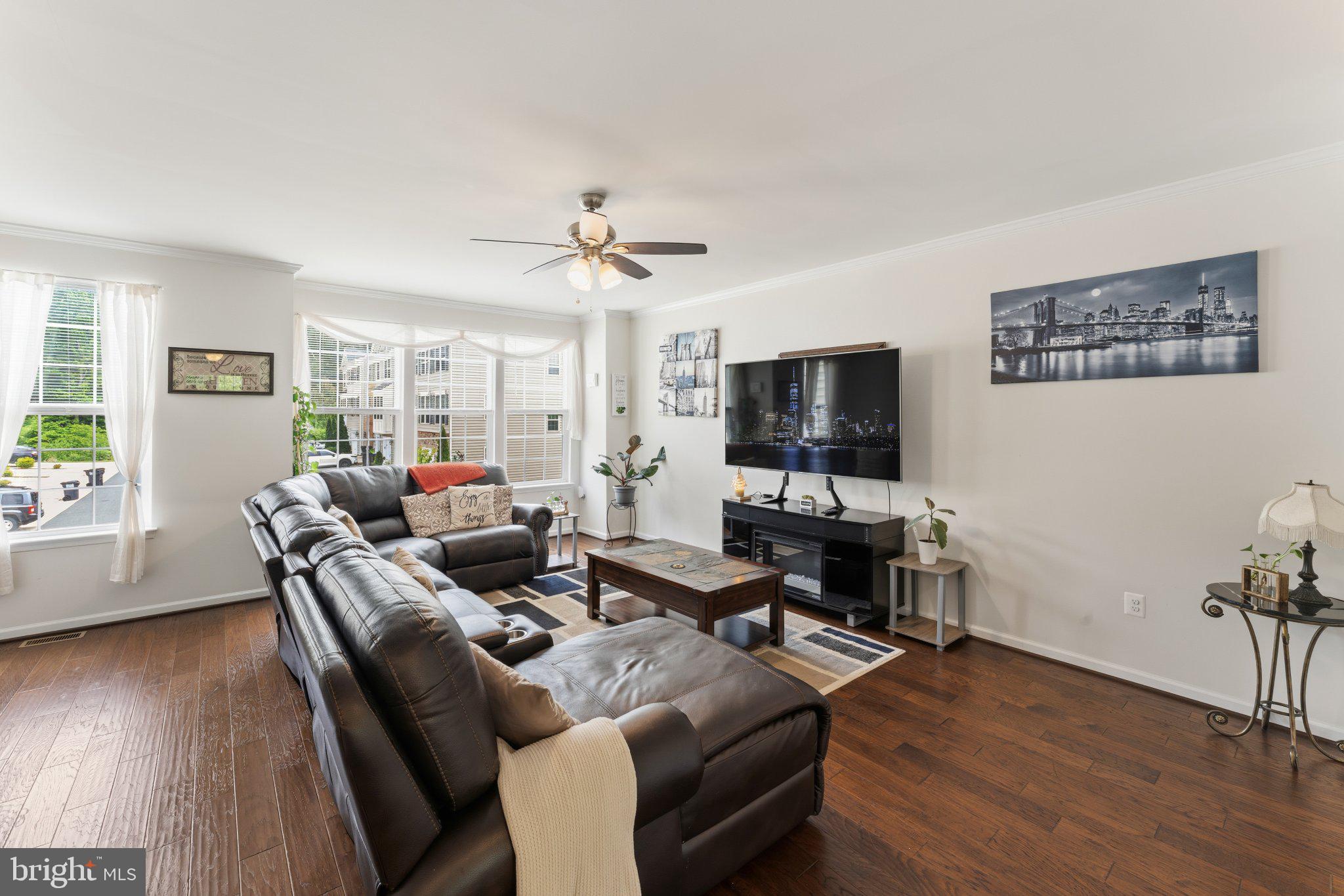 320 Tree Line Drive Fredericksburg, VA 22405 - Photo 22 of 49 a living room with furniture flat screen tv and wooden floor