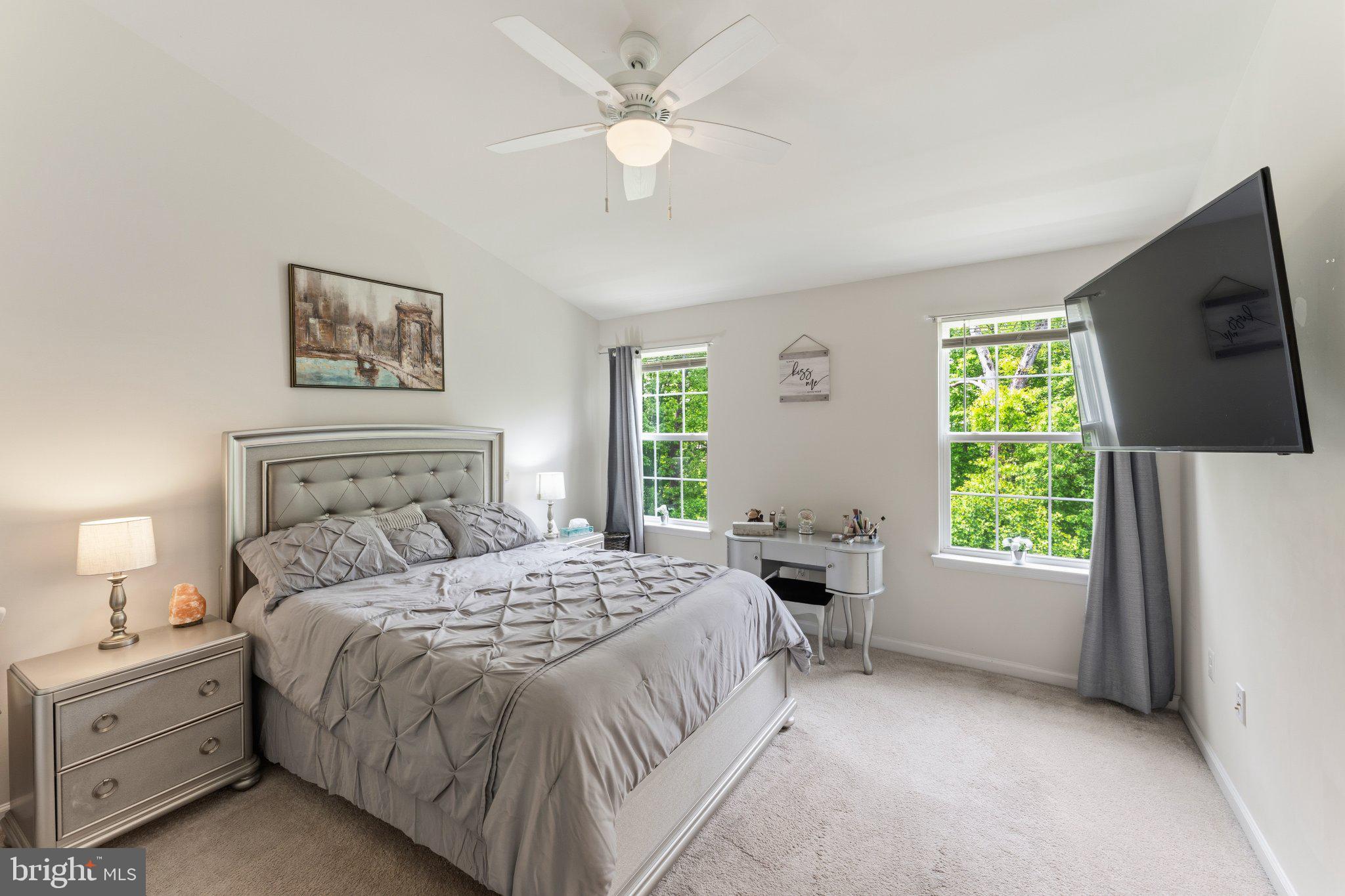 320 Tree Line Drive Fredericksburg, VA 22405 - Photo 28 of 49 a bedroom with a bed and a flat screen tv