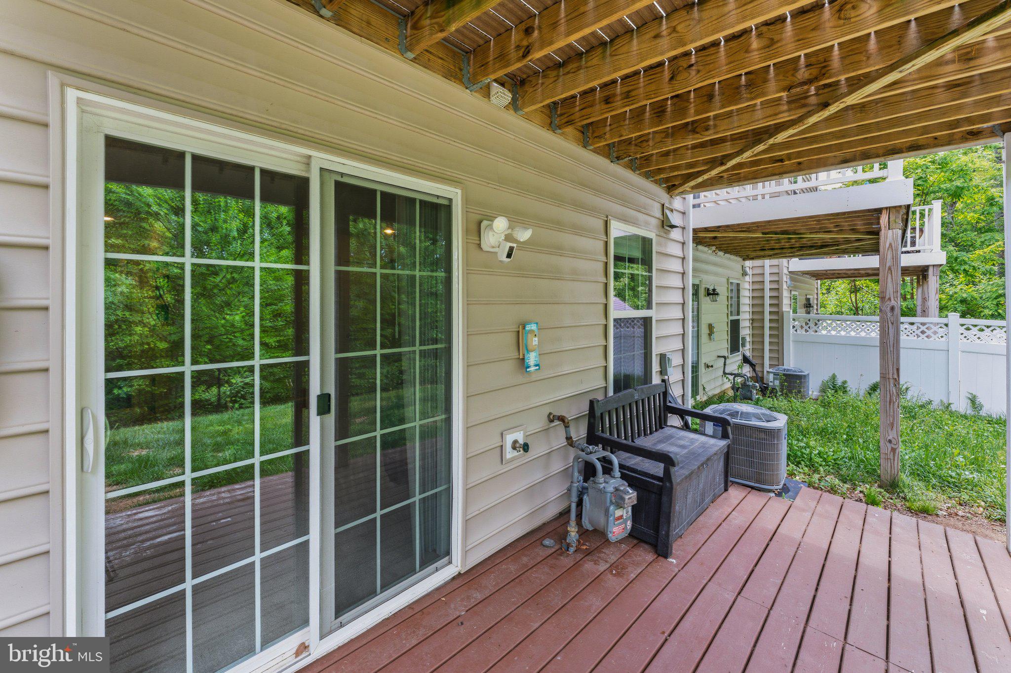 320 Tree Line Drive Fredericksburg, VA 22405 - Photo 43 of 49 a view of a house with a porch and wooden floor