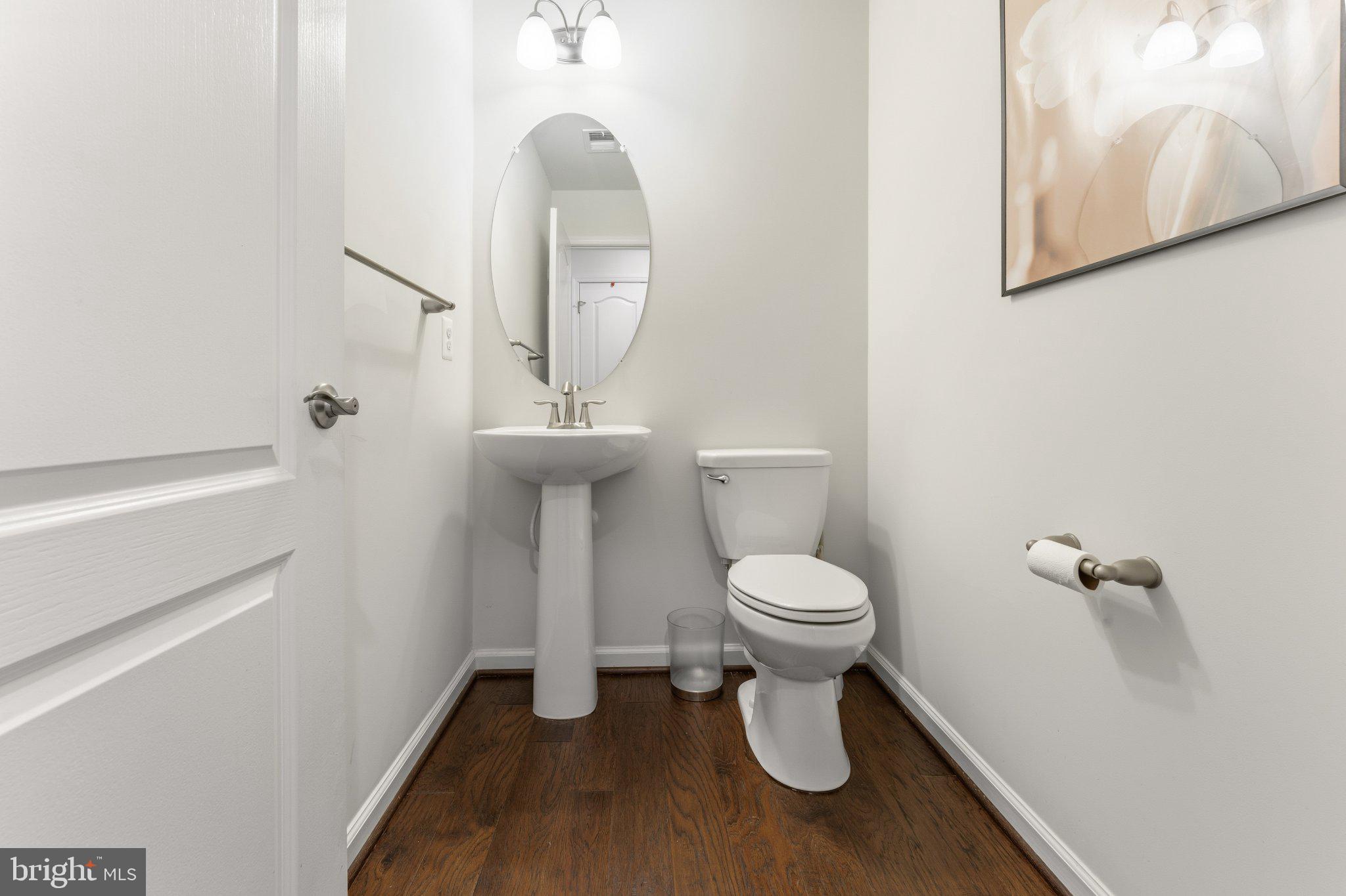 320 Tree Line Drive Fredericksburg, VA 22405 - Photo 10 of 49 a bathroom with a toilet and a mirror