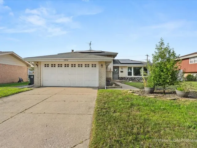front view of house with a yard