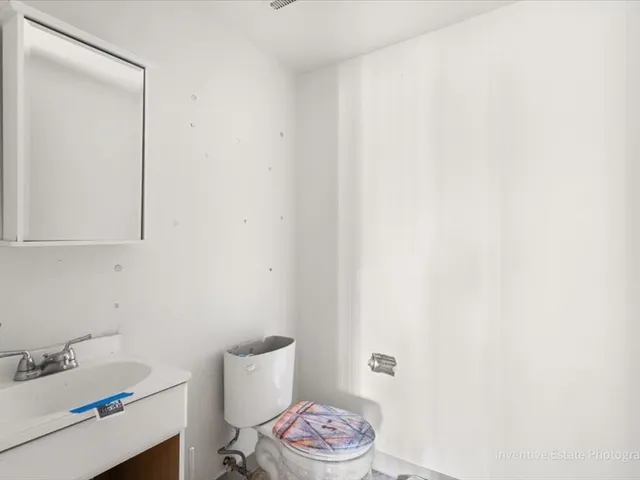 a bathroom with a sink and a toilet