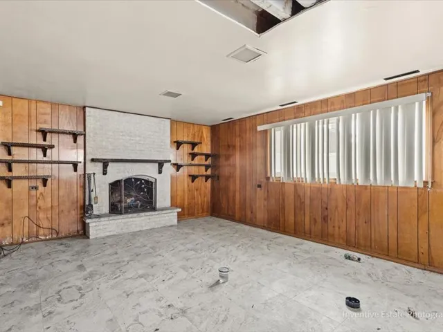 a view of a livingroom with a fireplace