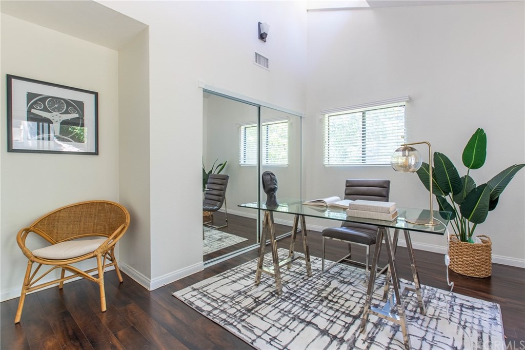 1881 Alpha Road, Unit 5 Glendale, CA 91208 - Photo 17 of 29 a living room with furniture and a potted plant