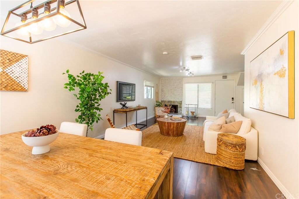1881 Alpha Road, Unit 5 Glendale, CA 91208 - Photo 6 of 29 a living room with furniture and a potted plant