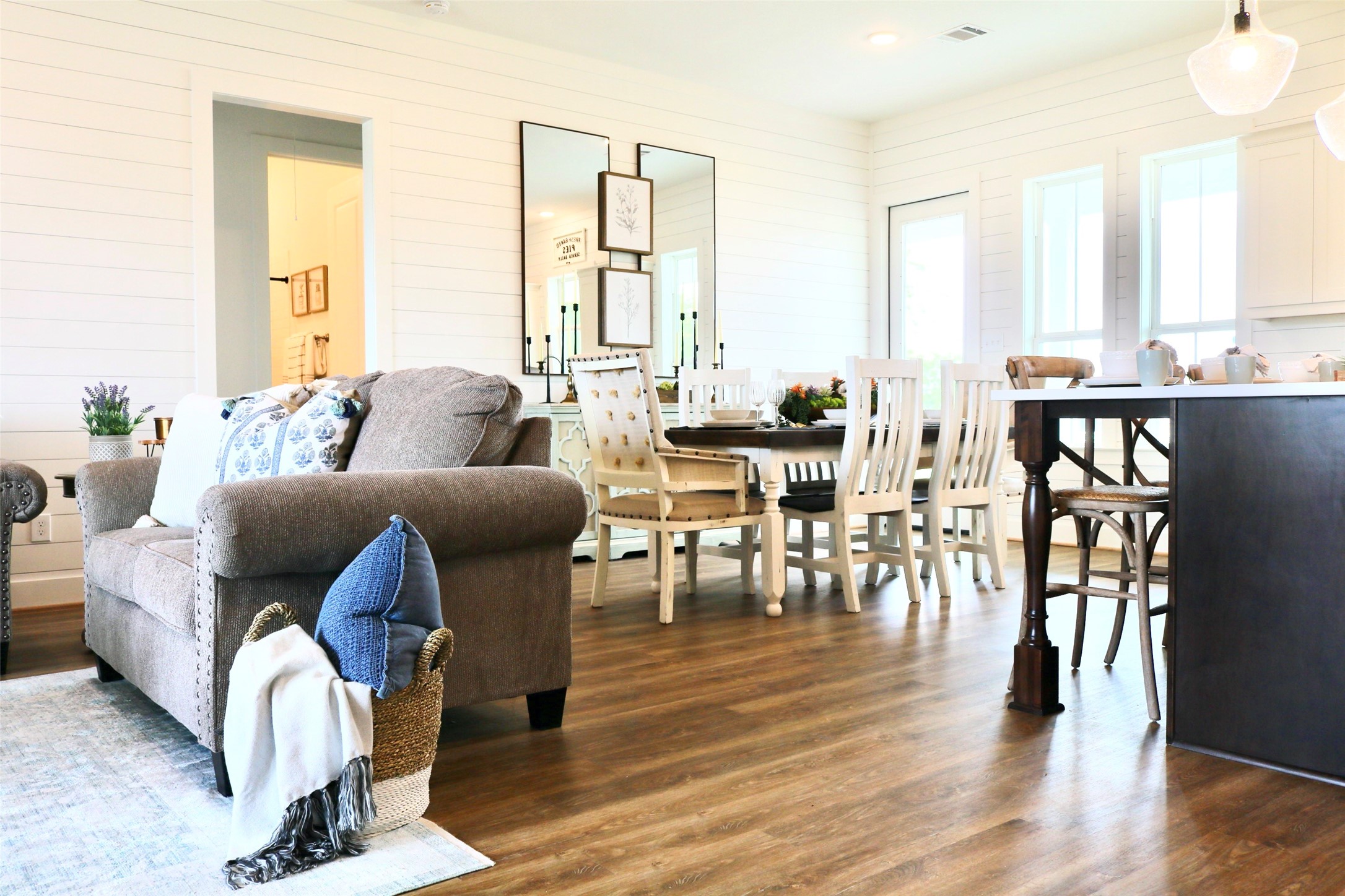 6507 Highway 290 East Brenham, TX 77833 - Photo 7 of 16 a living room with furniture wooden floor and floor to ceiling windows