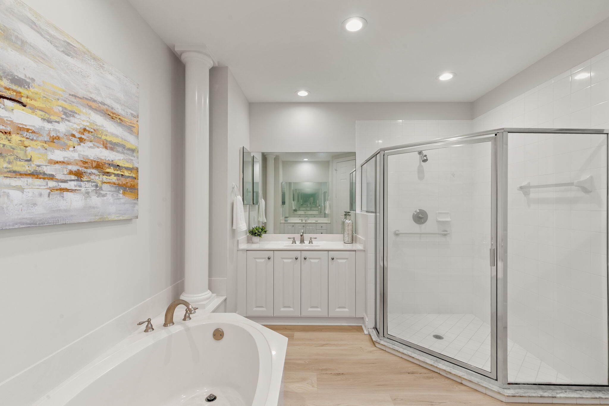 9213 Museo Circle, Unit 103 Naples, FL 34114 - Photo 18 of 47 a bathroom with a bathtub and a shower