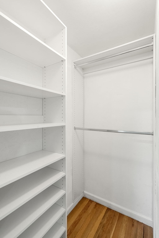 98 Union Street Norfolk, MA 02056 - Photo 28 of 38 a view of walk in closet with empty racks