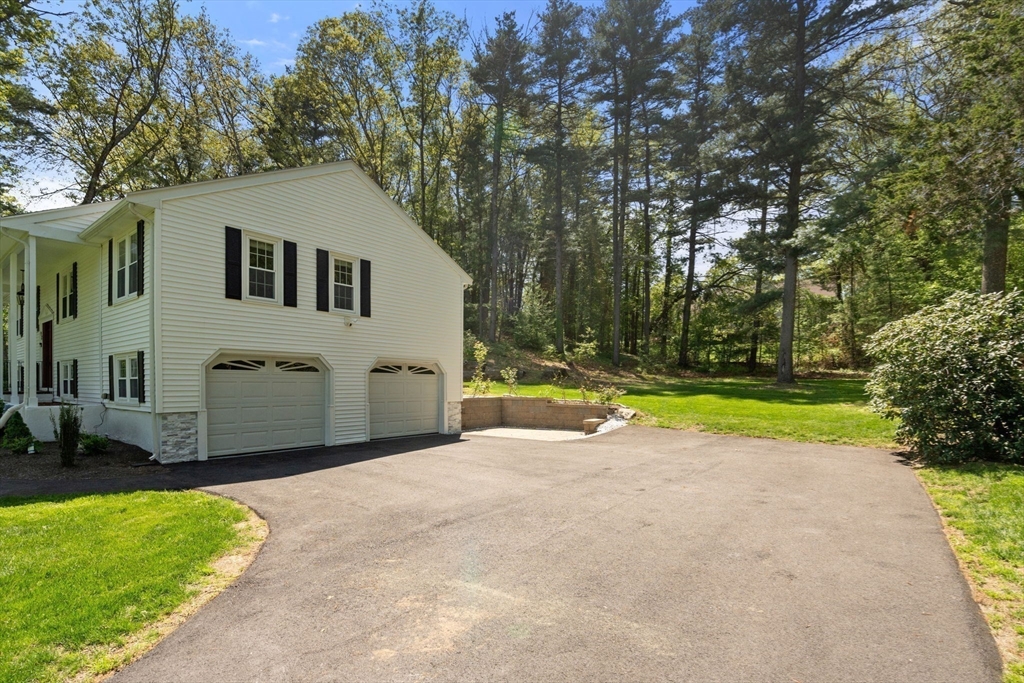 98 Union Street Norfolk, MA 02056 - Photo 35 of 38 a view of a house with backyard and trees