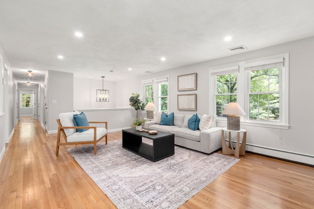 98 Union Street Norfolk, MA 02056 - Photo 5 of 38 a living room with furniture and a large window
