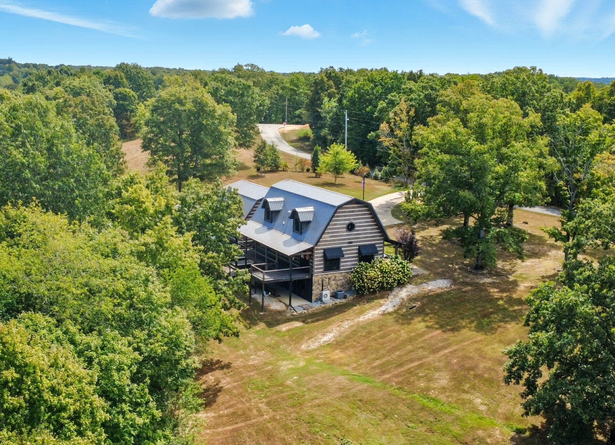 102 Highwater Road Waverly, TN 37185 - Photo 12 of 51 an aerial view of a house with a yard