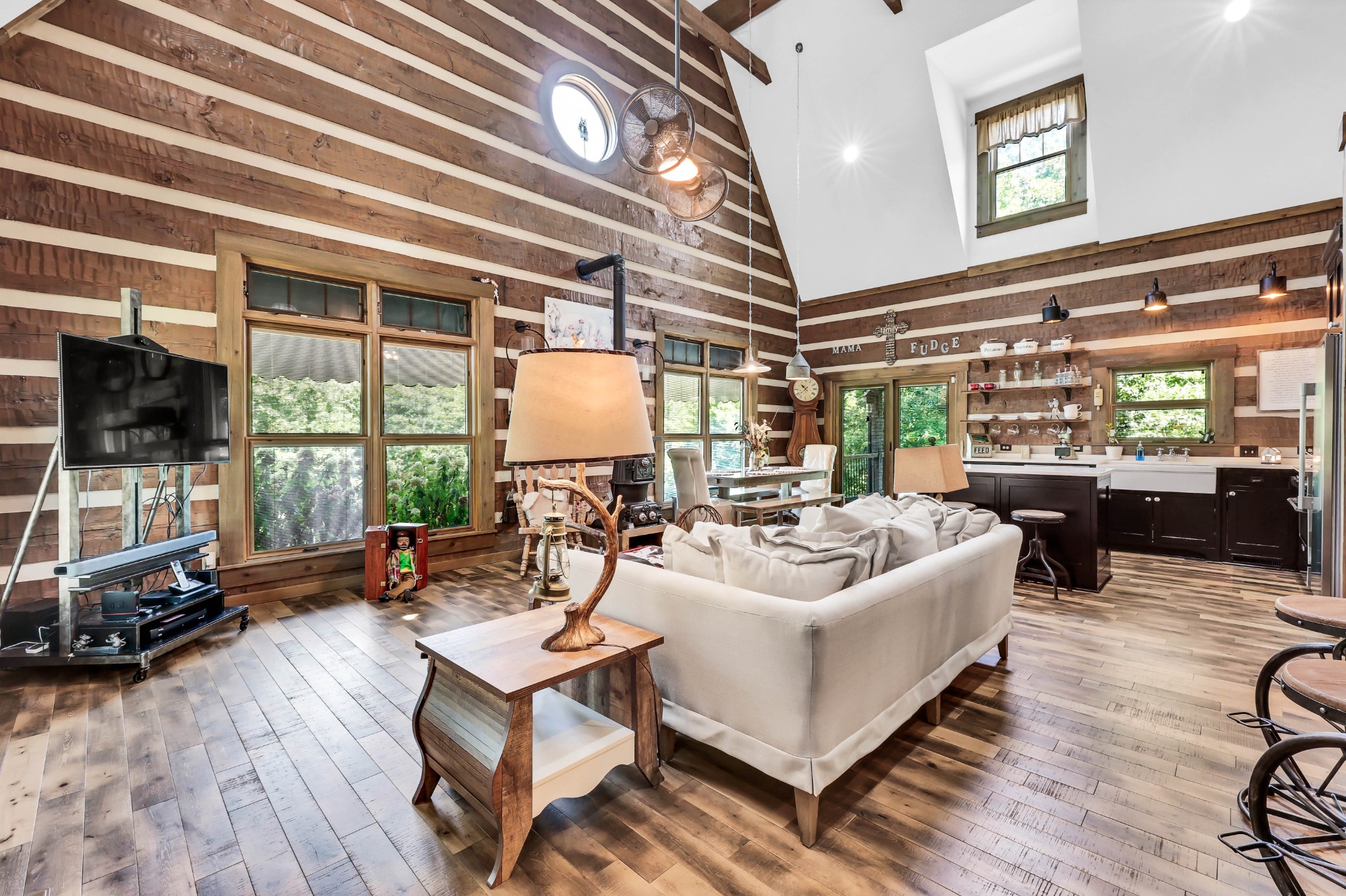 102 Highwater Road Waverly, TN 37185 - Photo 17 of 51 a living room with furniture and a flat screen tv