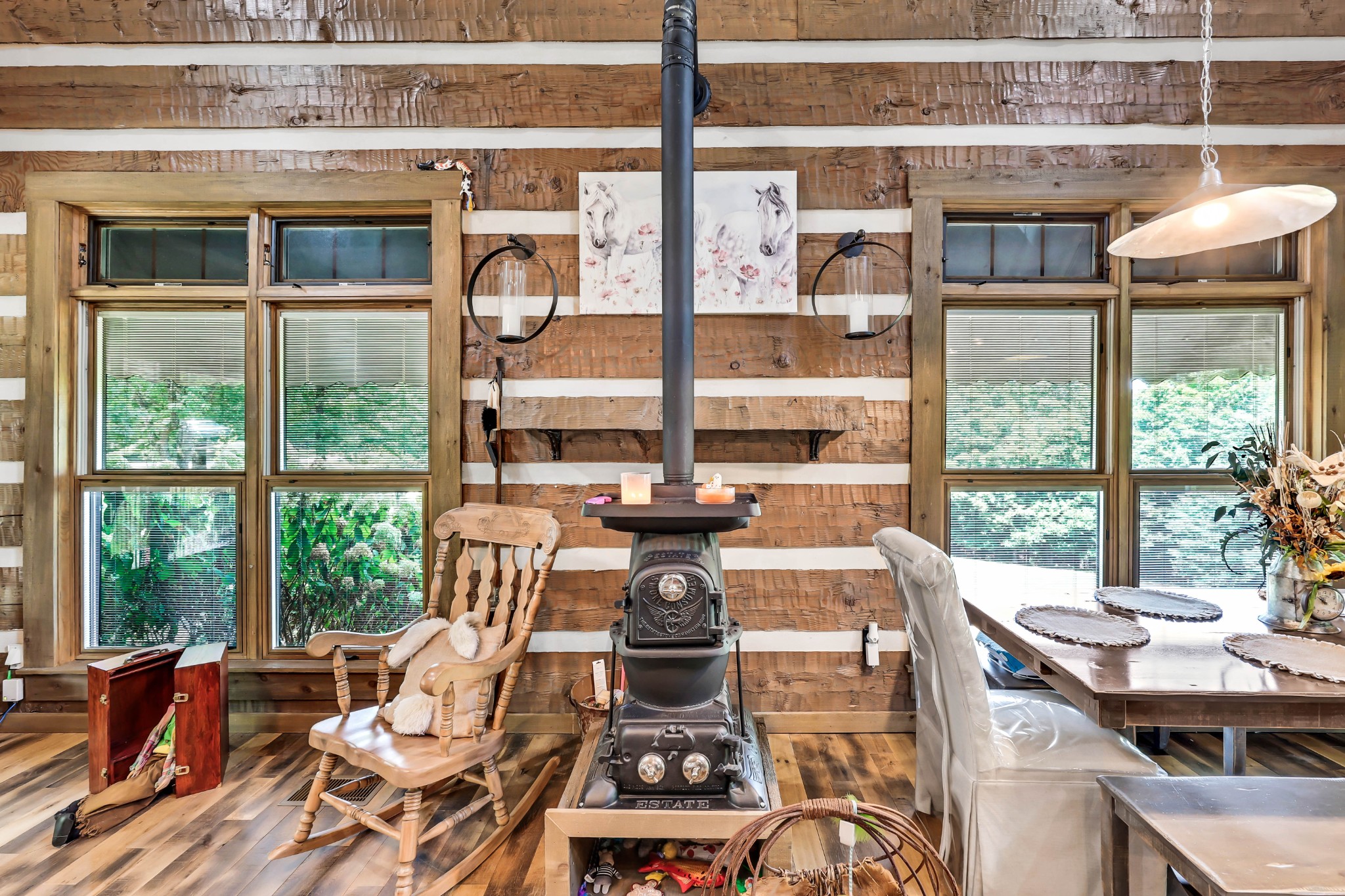 102 Highwater Road Waverly, TN 37185 - Photo 19 of 51 a view of a dining room with furniture wooden floor and a chandelier