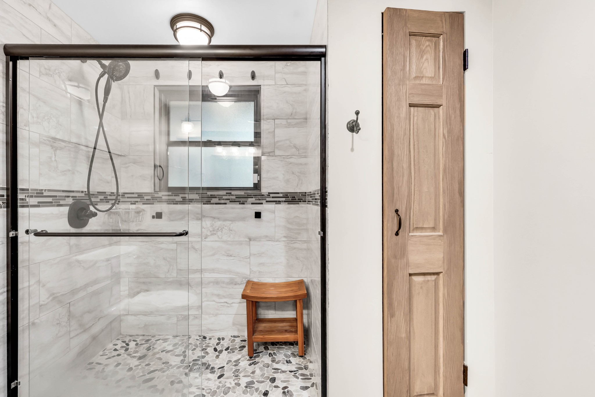 102 Highwater Road Waverly, TN 37185 - Photo 32 of 51 a bathroom with a granite countertop shower a sink and a mirror