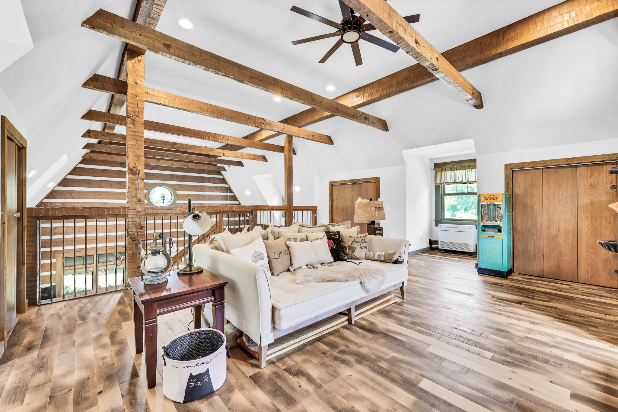 102 Highwater Road Waverly, TN 37185 - Photo 36 of 51 a spacious bedroom with a bed and wooden floor