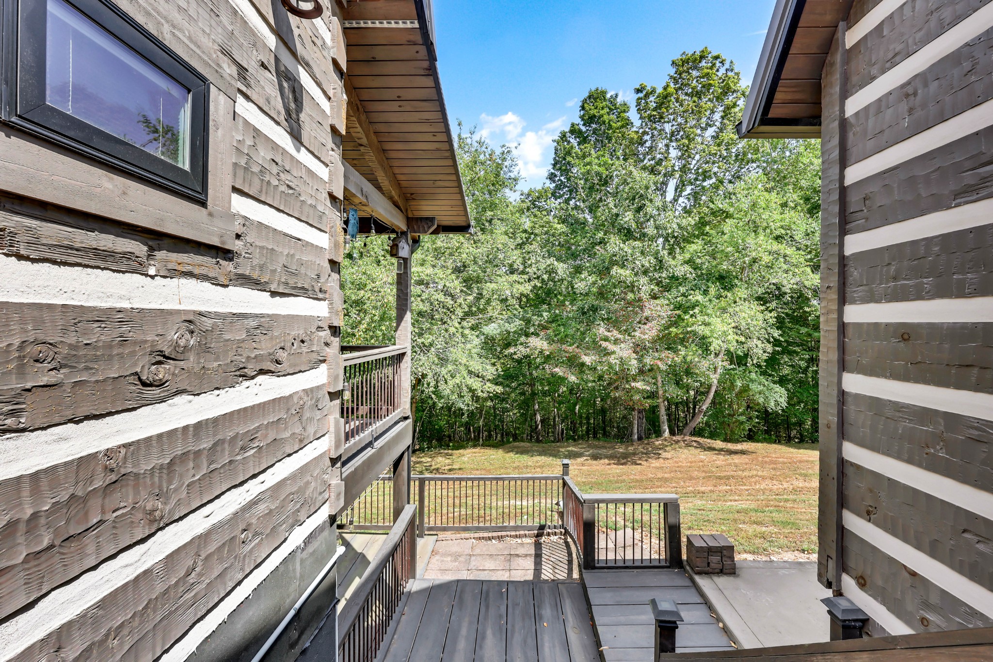 102 Highwater Road Waverly, TN 37185 - Photo 41 of 51 a view of a balcony with wooden floor and potted plants