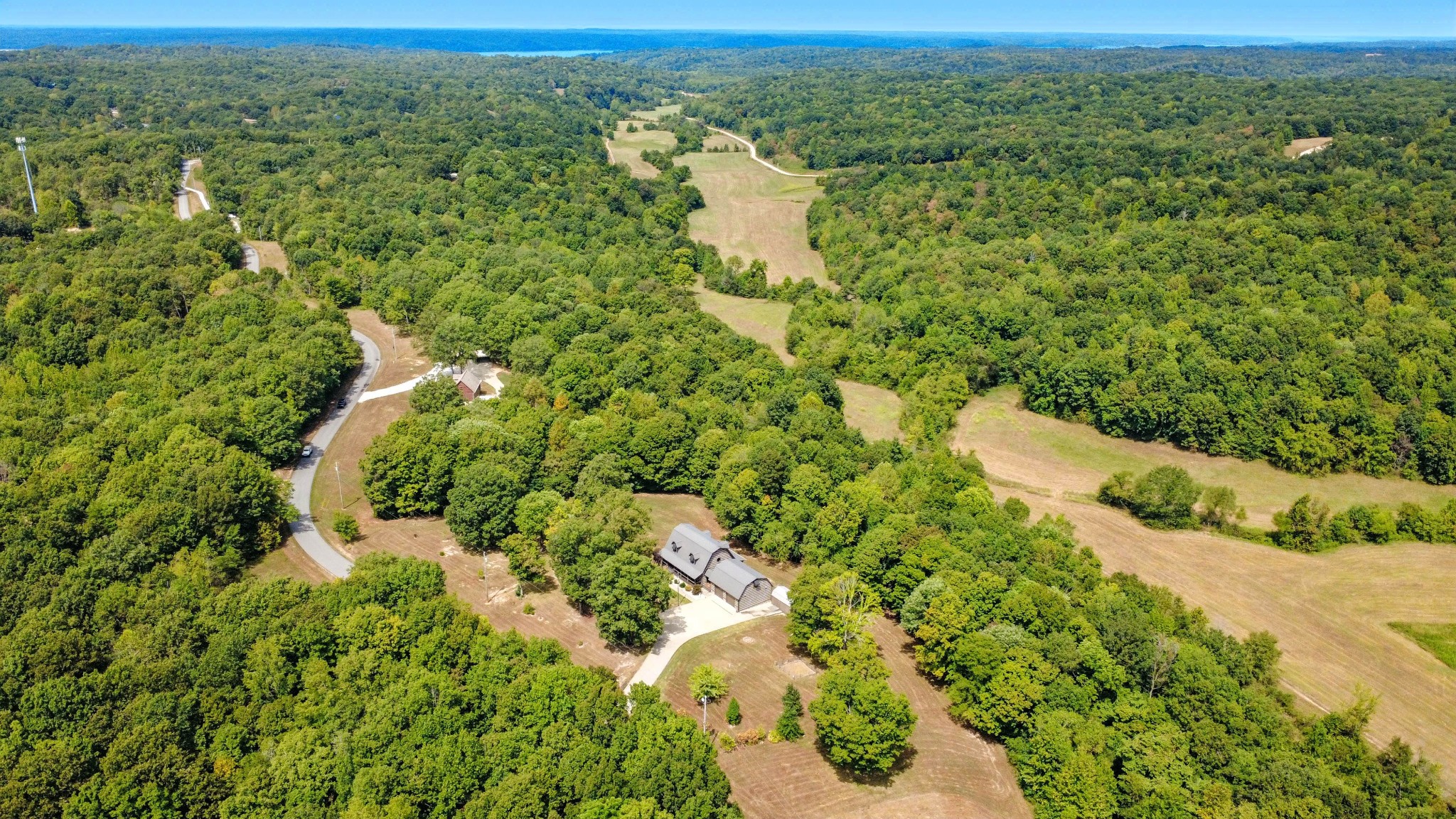 102 Highwater Road Waverly, TN 37185 - Photo 8 of 51 a view of a lake with a city
