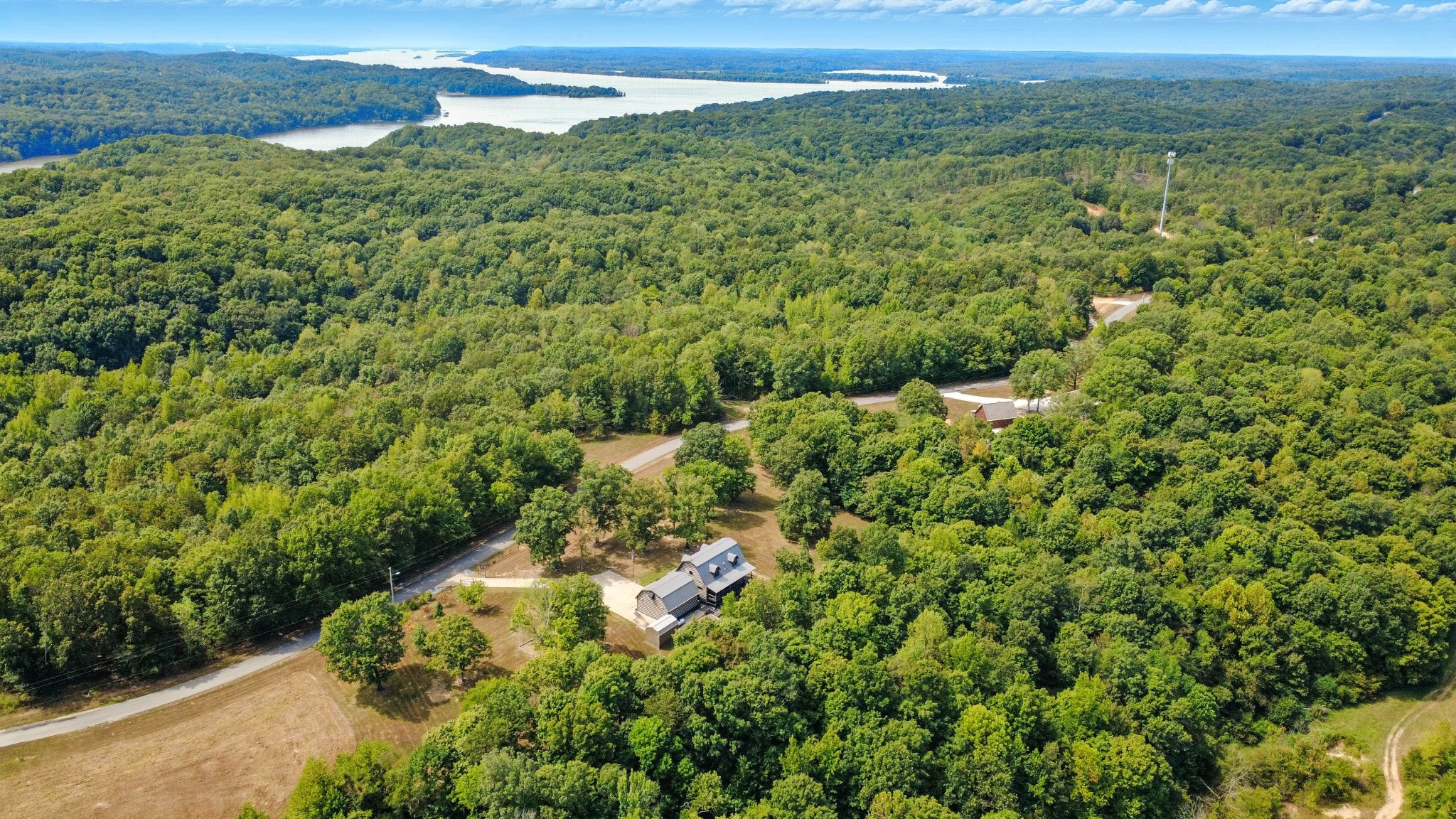 102 Highwater Road Waverly, TN 37185 - Photo 10 of 51 a view of a lush green forest with a mountain