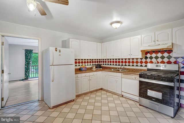 a view of a livingroom with wooden floor