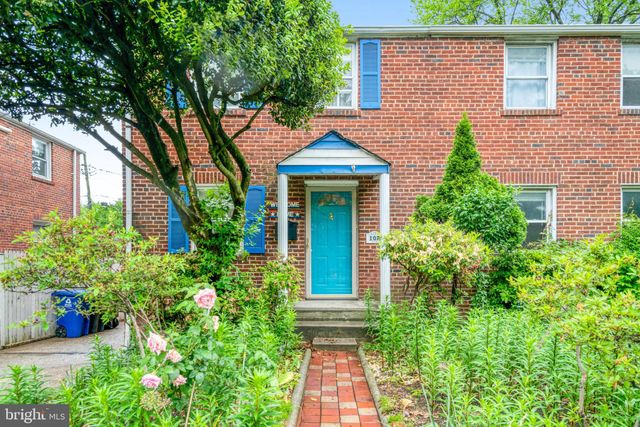 a view of a house with a tree