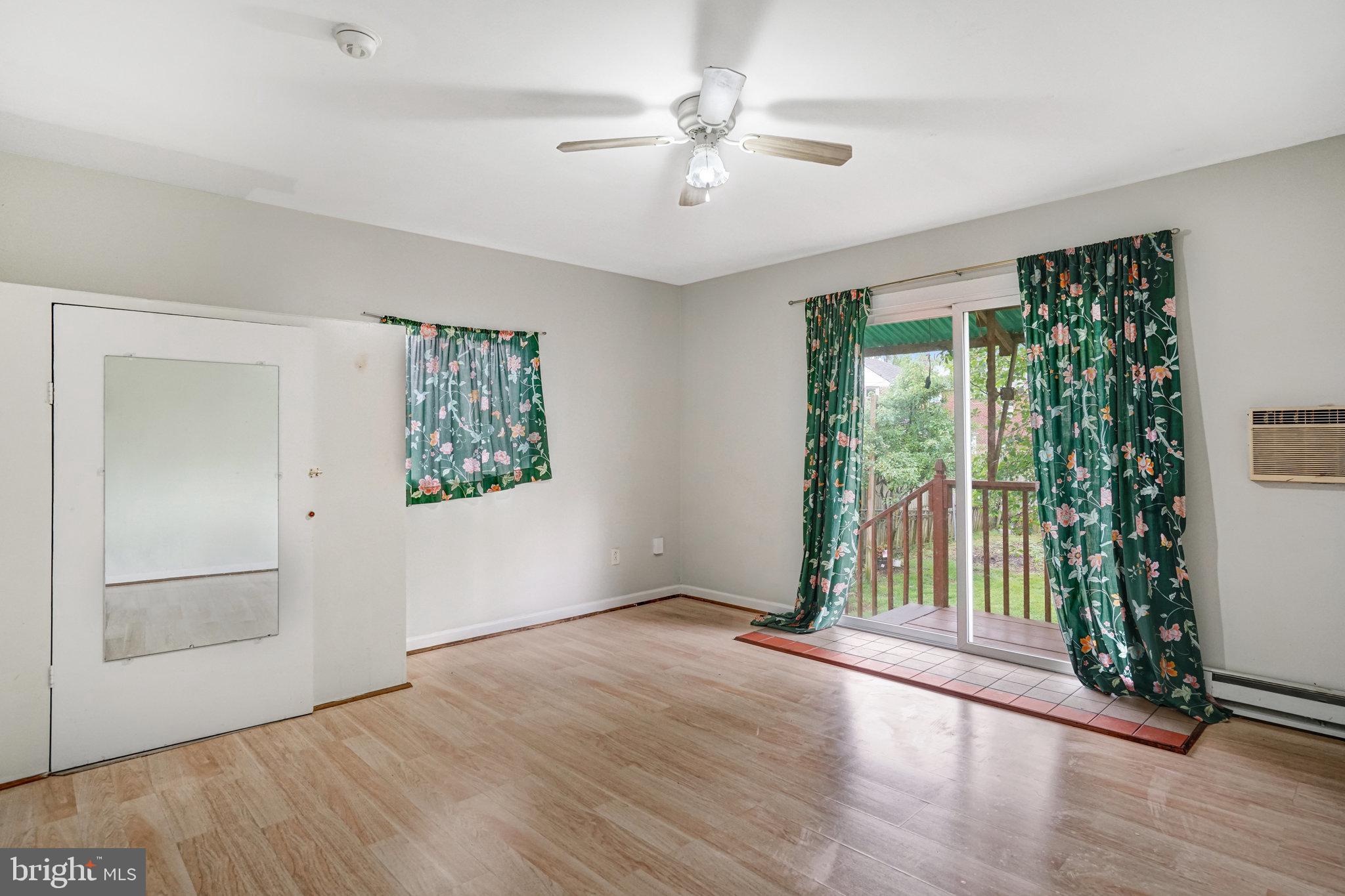 102 South Glebe Road Arlington, VA 22204 - Photo 22 of 52 wooden floor in an empty room with a window