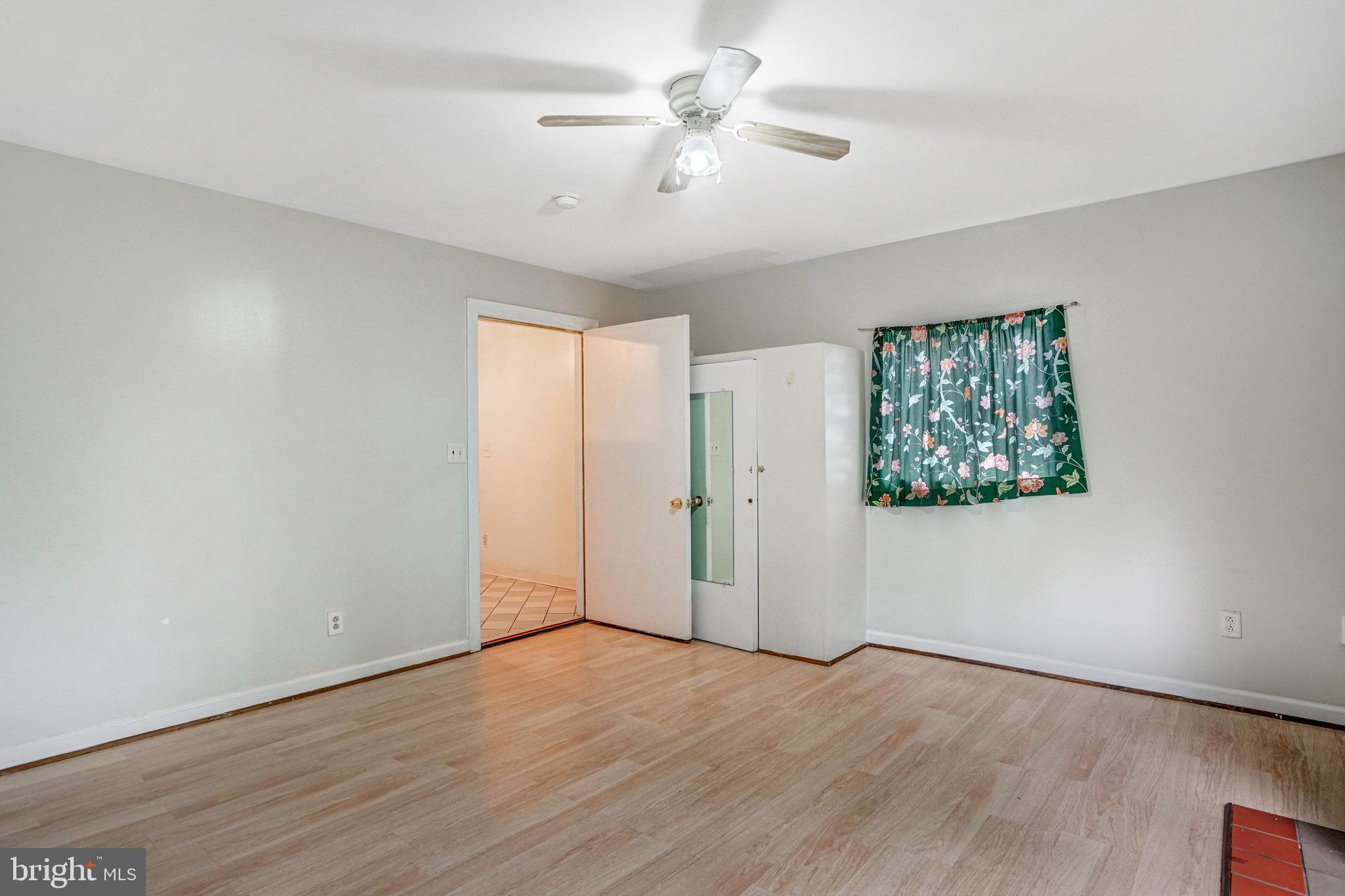 102 South Glebe Road Arlington, VA 22204 - Photo 23 of 52 wooden floor in an empty room with a window