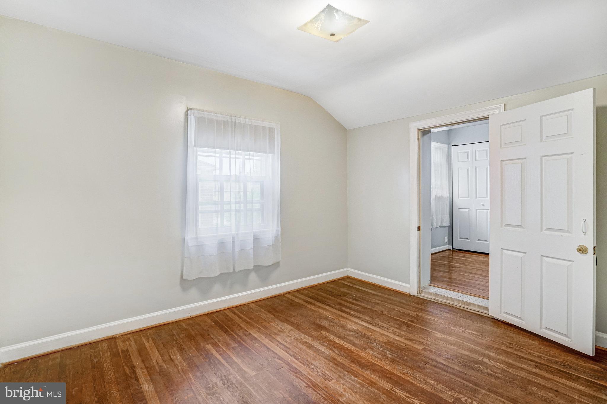102 South Glebe Road Arlington, VA 22204 - Photo 30 of 52 a view of empty room with wooden floor and fan