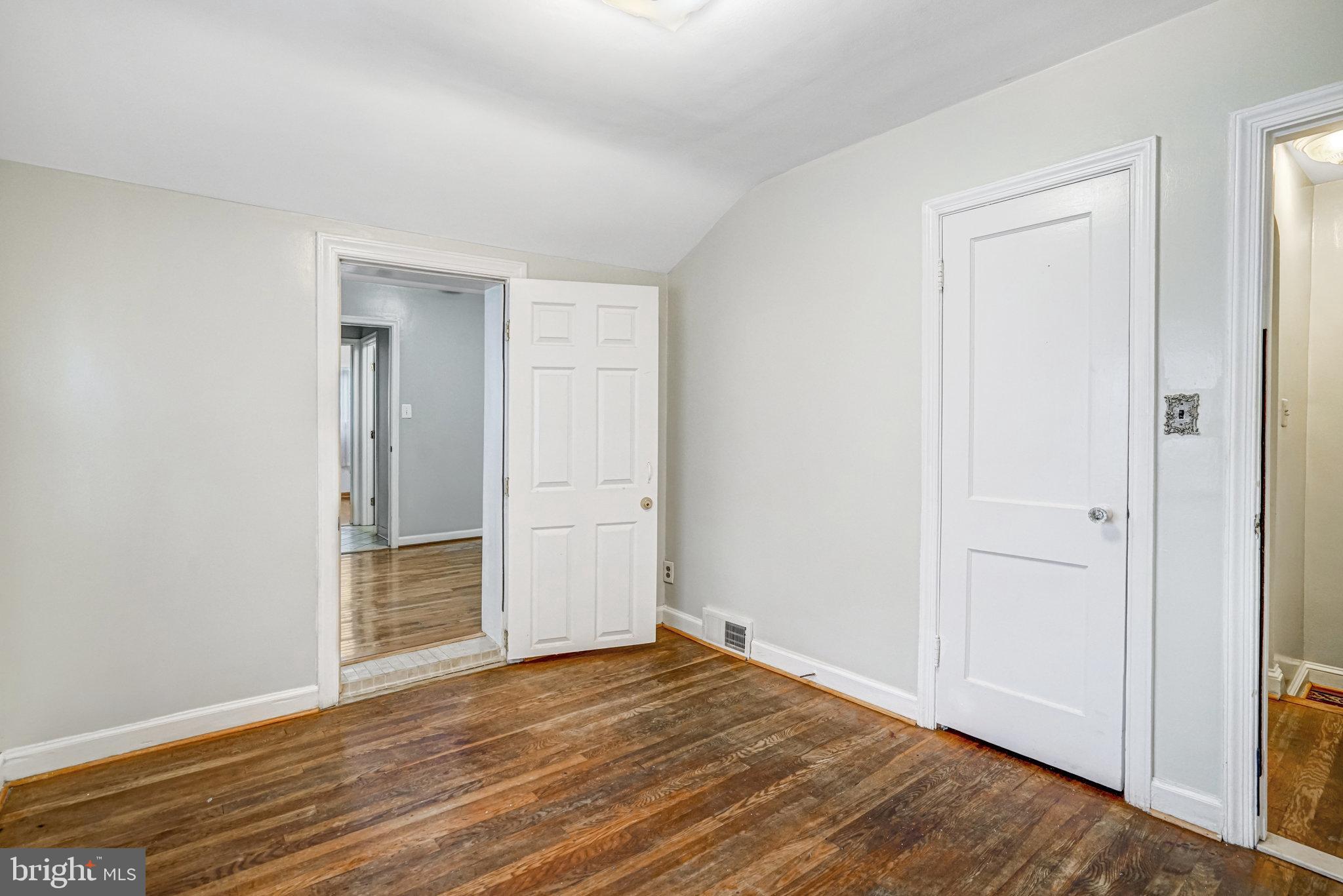 102 South Glebe Road Arlington, VA 22204 - Photo 31 of 52 a view of an empty room with wooden floor