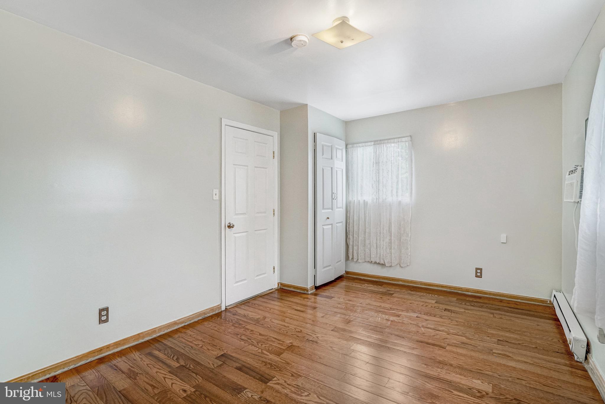 102 South Glebe Road Arlington, VA 22204 - Photo 40 of 52 wooden floor in an empty room