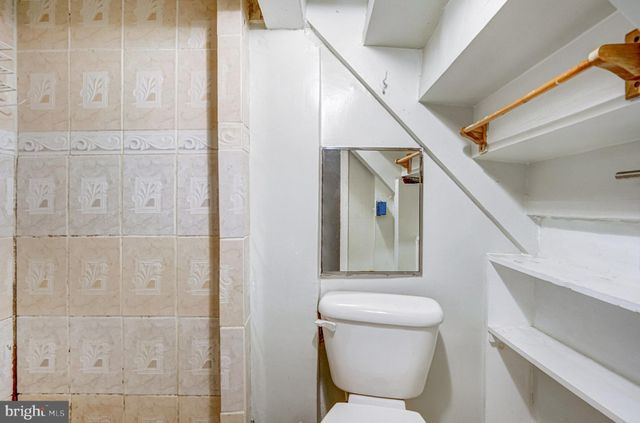 a view of a balcony with wooden floor