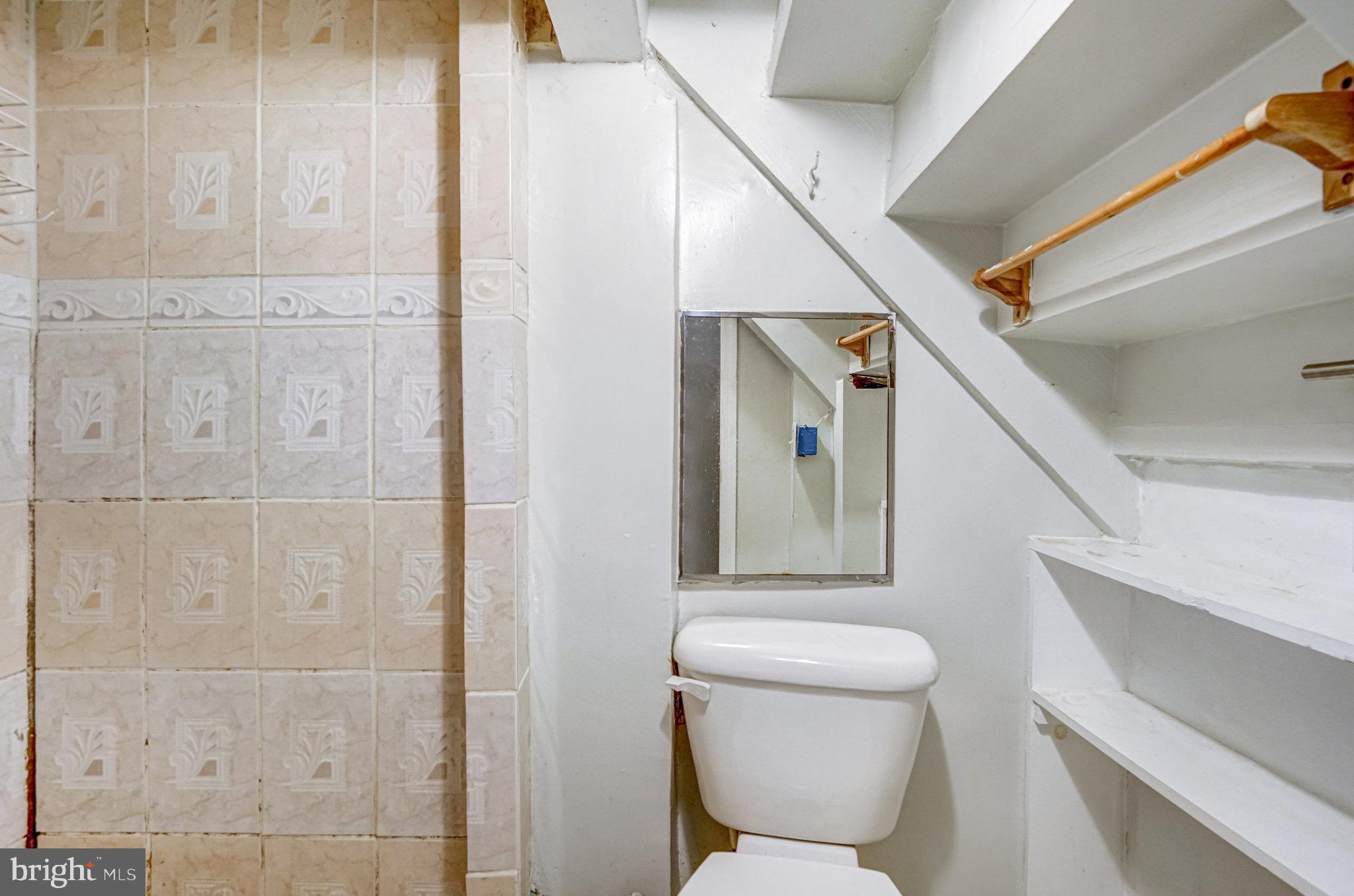 102 South Glebe Road Arlington, VA 22204 - Photo 46 of 52 a bathroom with a toilet and a shower