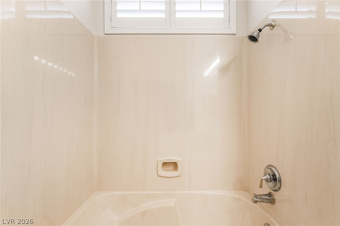 3033 Hartsville Road Henderson, NV 89052 - Photo 35 of 41 A well-maintained tub-shower combination offers daily comfort and ease.