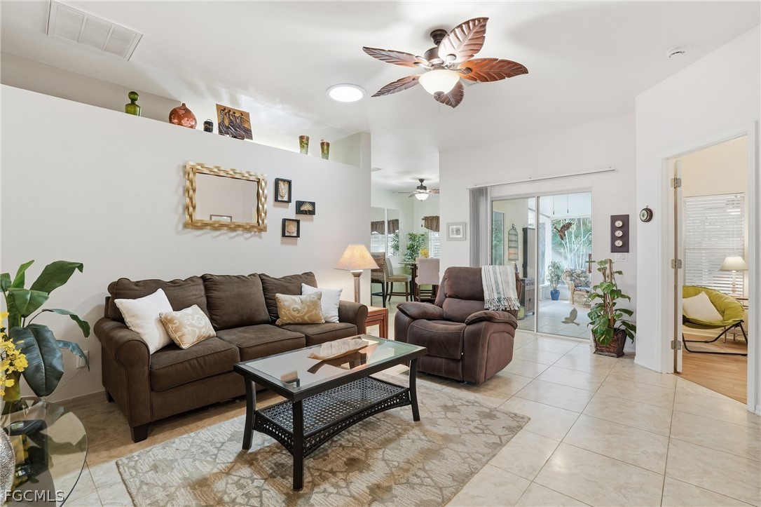 10730 Rio Mar Circle Estero, FL 33928 - Photo 4 of 47 a living room with furniture
