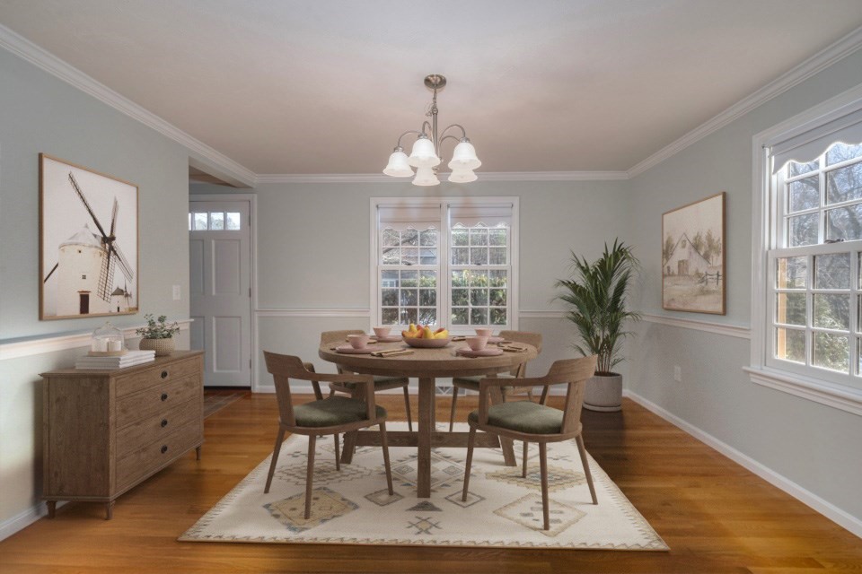 21 Strawberry Lane Whitman, MA 02382 - Photo 19 of 39 a view of a dining room with furniture window and wooden floor