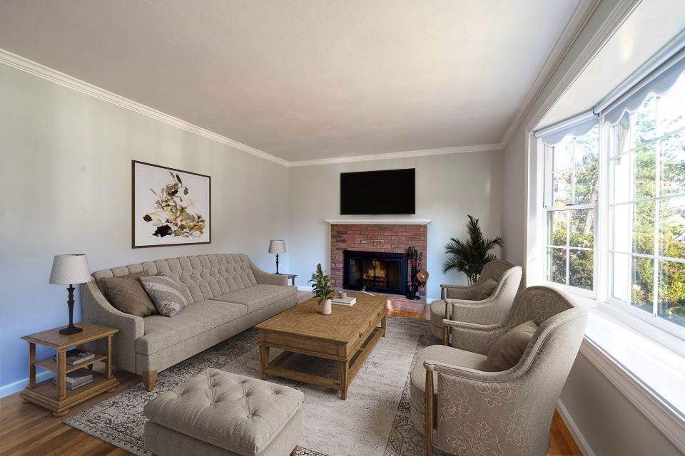 21 Strawberry Lane Whitman, MA 02382 - Photo 20 of 39 a living room with furniture fireplace and a large window