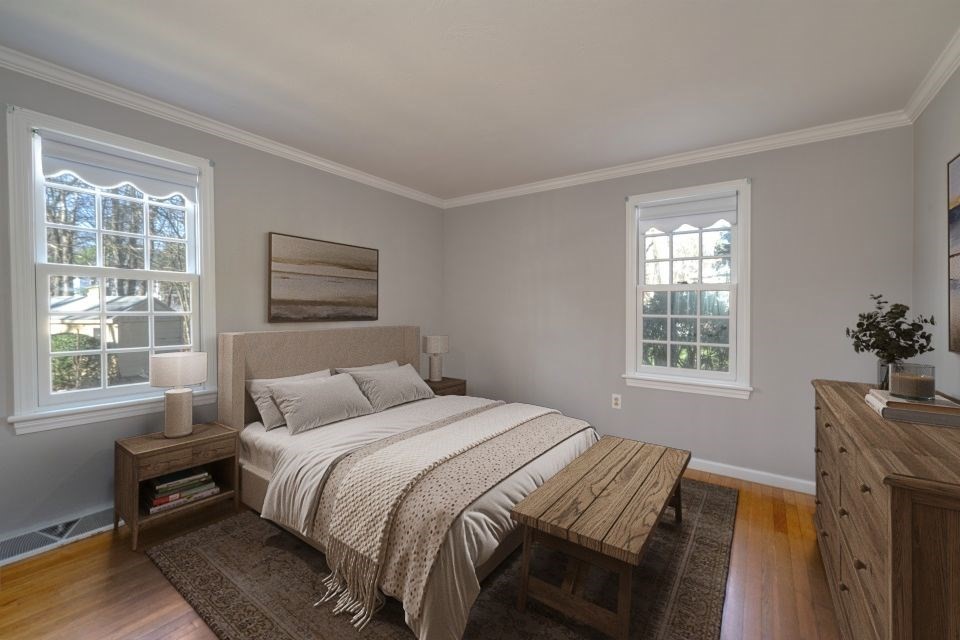 21 Strawberry Lane Whitman, MA 02382 - Photo 22 of 39 a bedroom with a bed and a window
