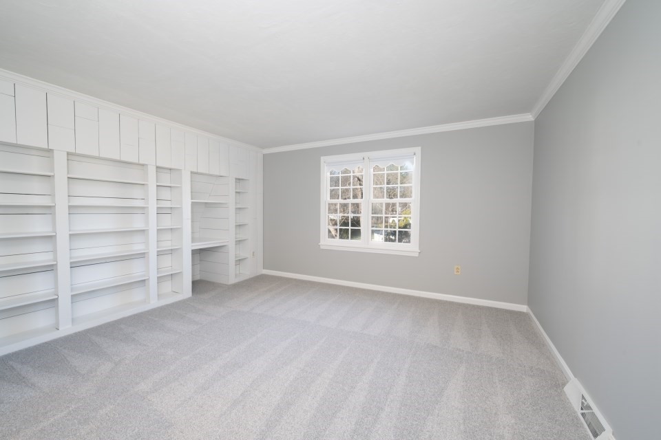 21 Strawberry Lane Whitman, MA 02382 - Photo 24 of 39 wooden floor in an empty room with a window