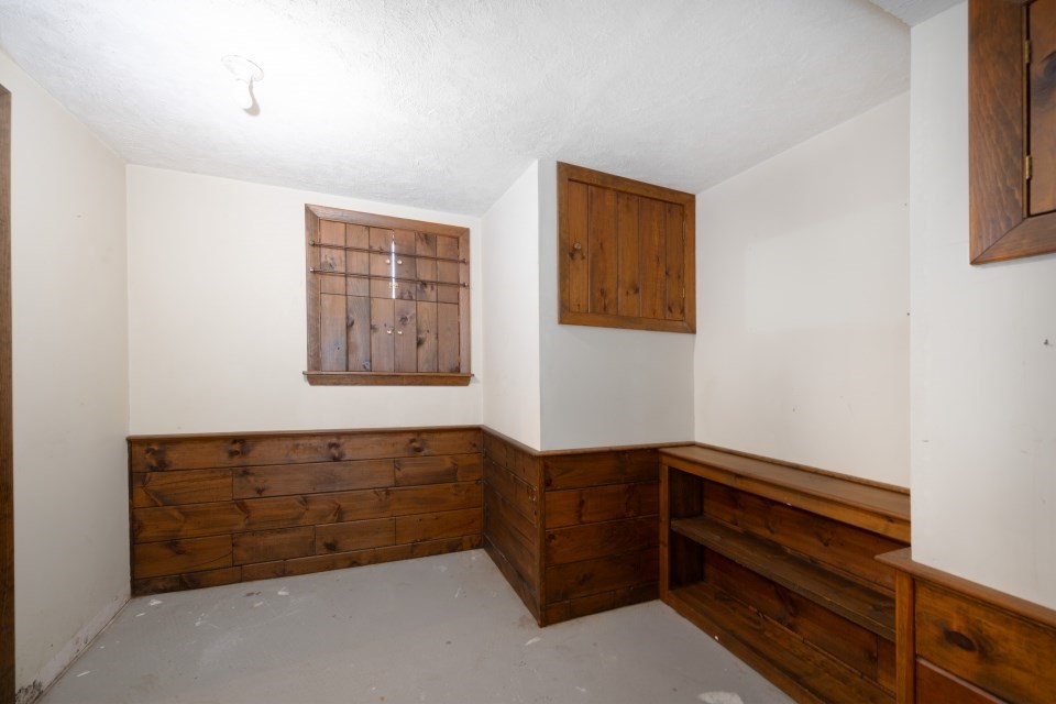 21 Strawberry Lane Whitman, MA 02382 - Photo 29 of 39 a view of an empty room with wooden floor