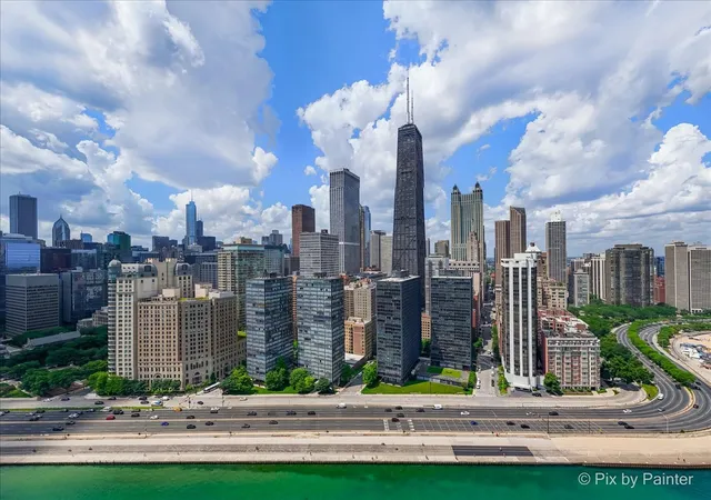 a view of a city with tall buildings