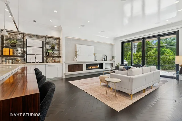 a living room with furniture and a table
