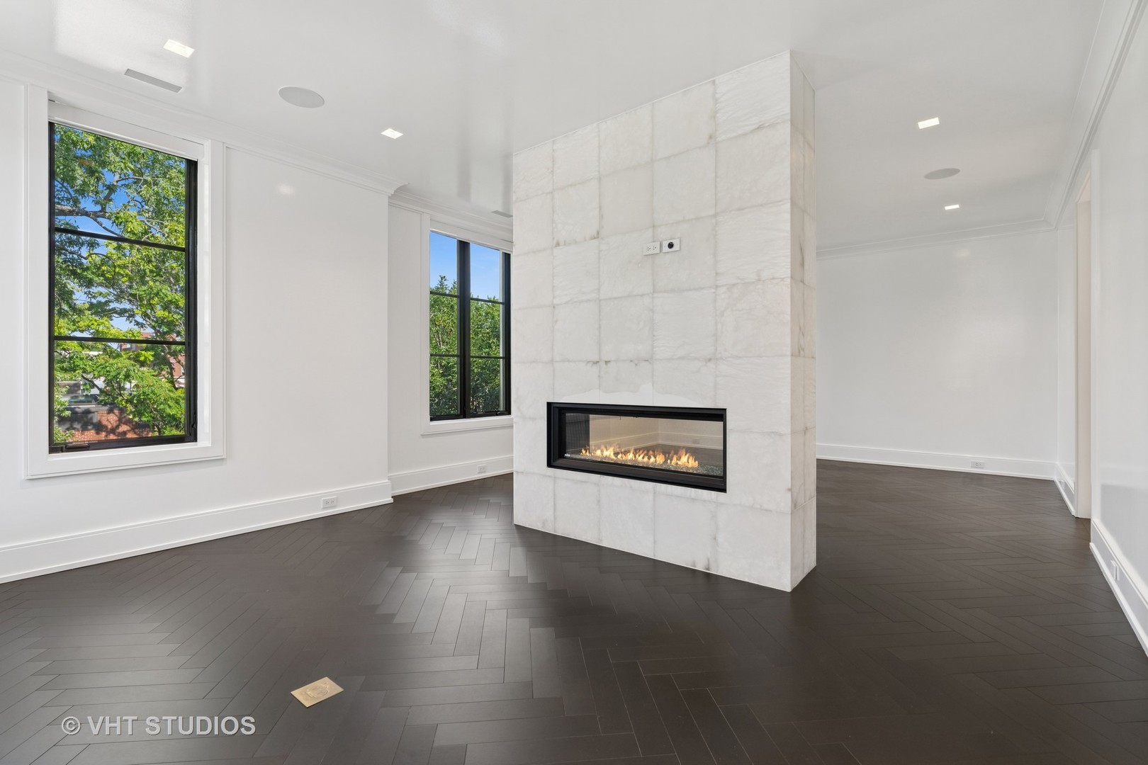 1878 North Orchard Street Chicago, IL 60614 - Photo 37 of 80 an empty room with windows and fireplace