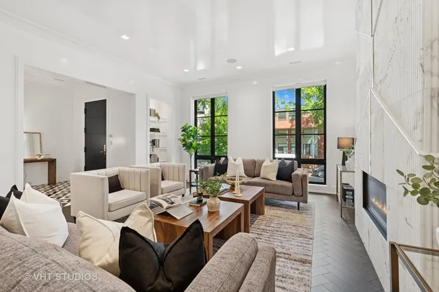 a bedroom with a bed and a fireplace