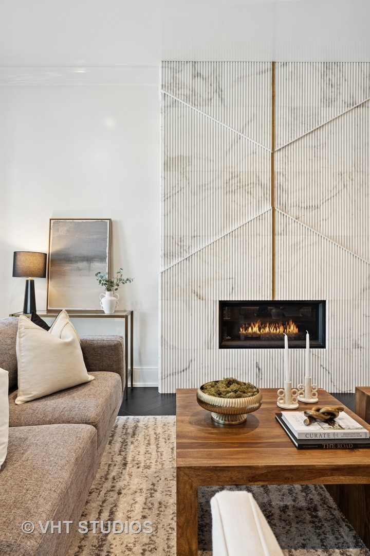 1878 North Orchard Street Chicago, IL 60614 - Photo 5 of 80 a bedroom with a bed and a fireplace