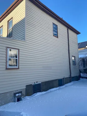 a view of backyard of a house