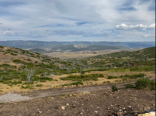 20 Q Puma Road Fairview, UT 84629 - Photo 27 of 27 Expansive mountain landscape featuring varied terrain and distant mountain ranges under a partly cloudy sky