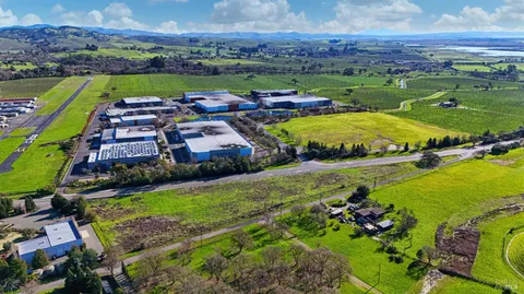 an aerial view of a house with a garden