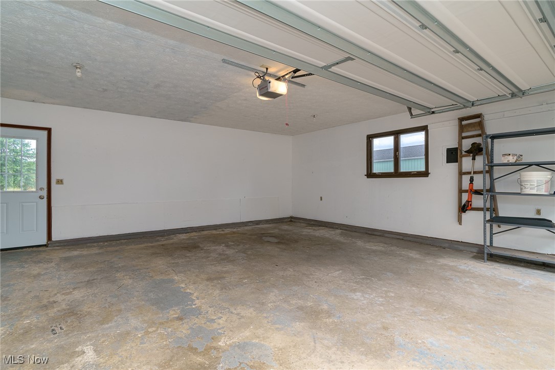 6747 Giddings Road Rootstown, OH 44272 - Photo 25 of 39 View of oversized two car garage with new door to back of home